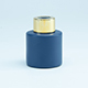 Marineblauw flesje met gouden dopje