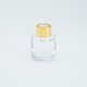 Transparant flesje met gouden dopje
