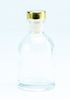 transparant flesje met gouden dopje