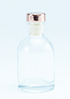 transparant flesje met rosé gouden dopje